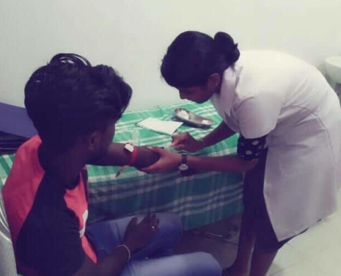 Thilaksha administering injection