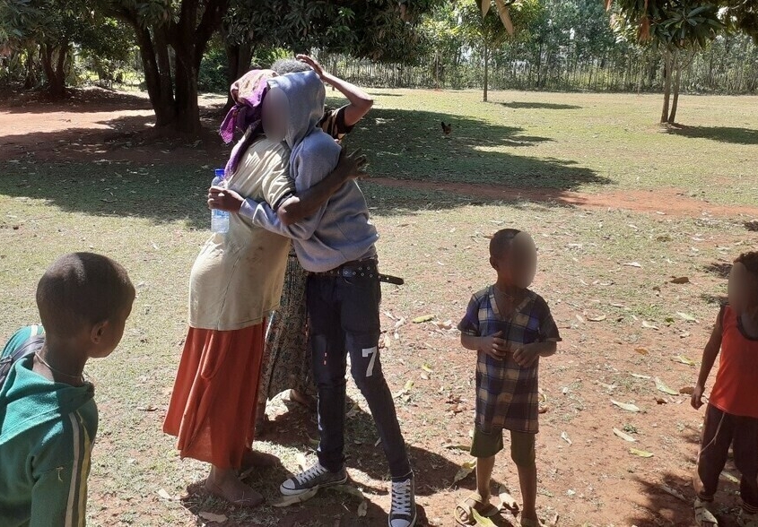Abenezer family reunion blurred faces